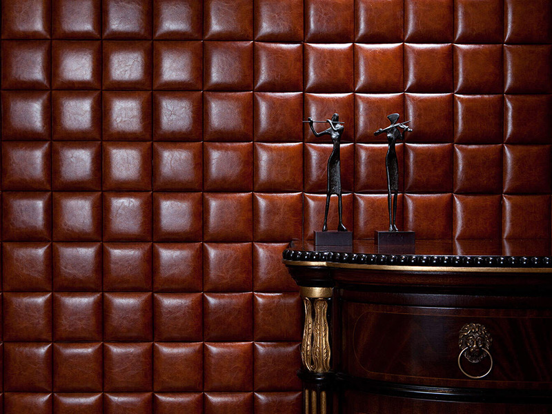 دیوارپوش چرمی با رنگ قهوه ای و میز و مجسمه قهوه ای رنگ - اوحددکو - Brown leather wall covering and brown table - ohaddeco